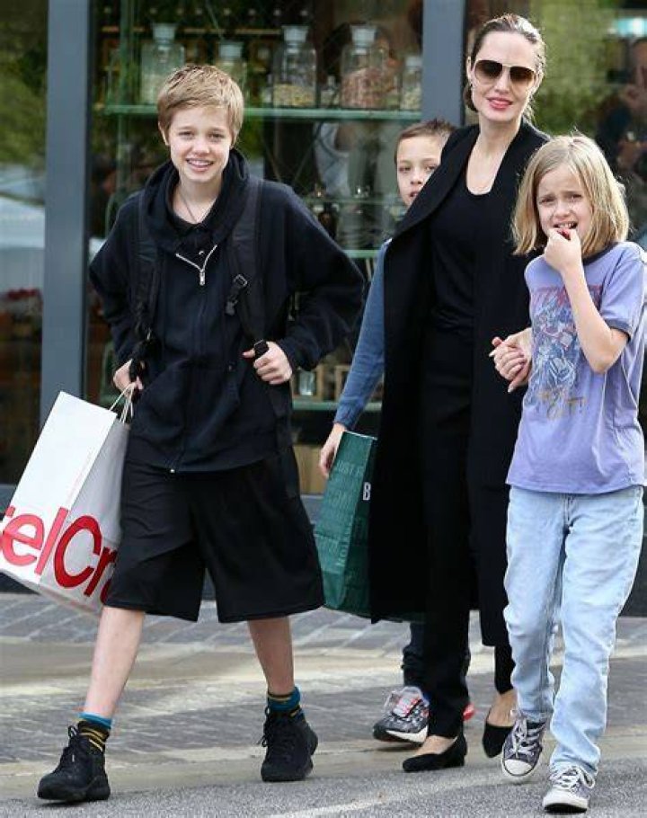 Angelina Jolie went Christmas shopping at the Grove with Knox, Vivienne & Shiloh ·