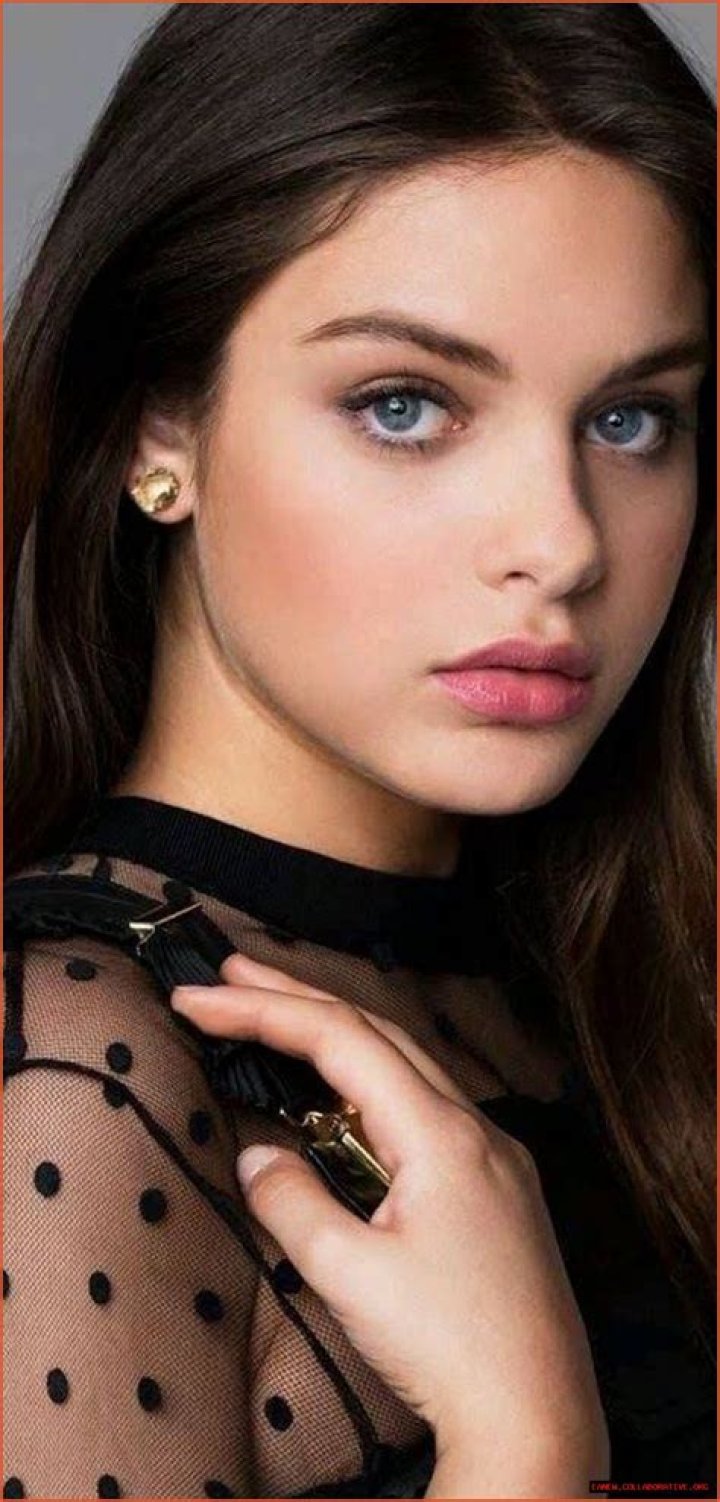 The Allure Of Emerald Eyes And Dark Locks